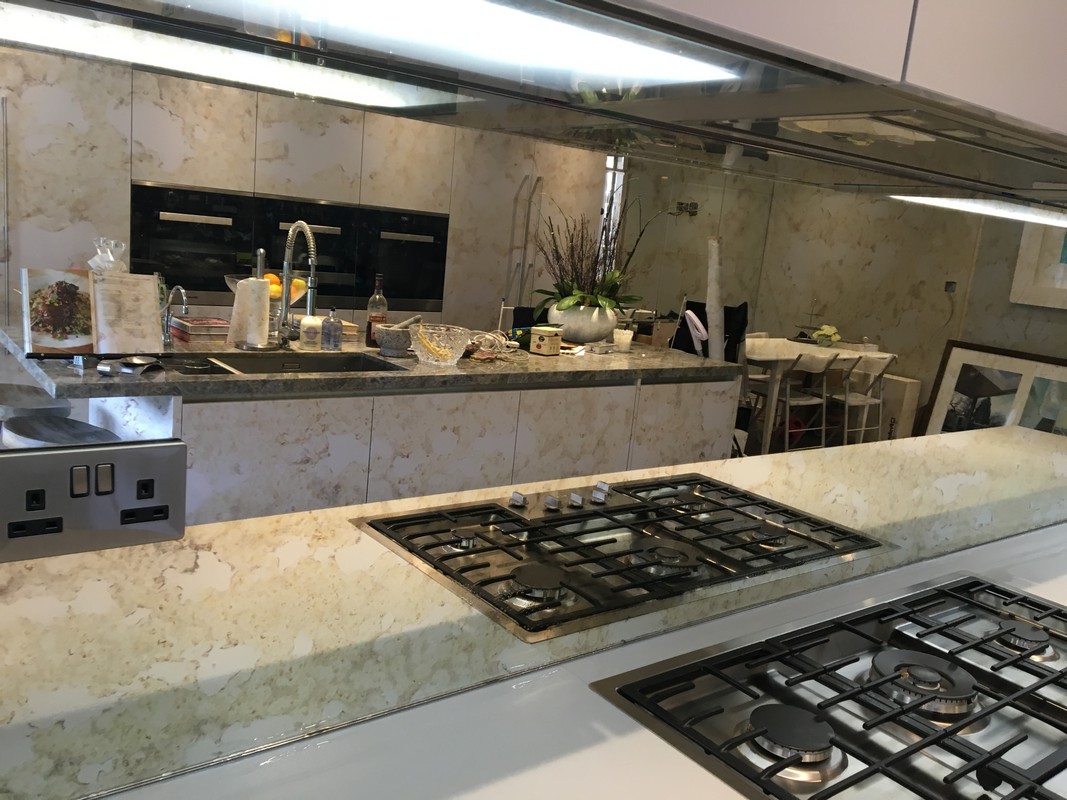 Mirror glass splashback in Rickmansworth luxury kitchen