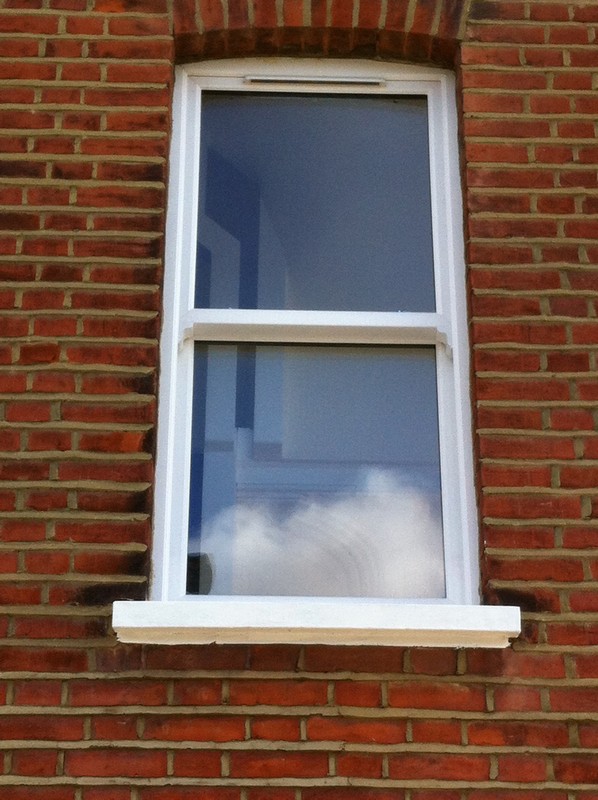 uPVC sash window on Victorian red brick house in Rickmansworth